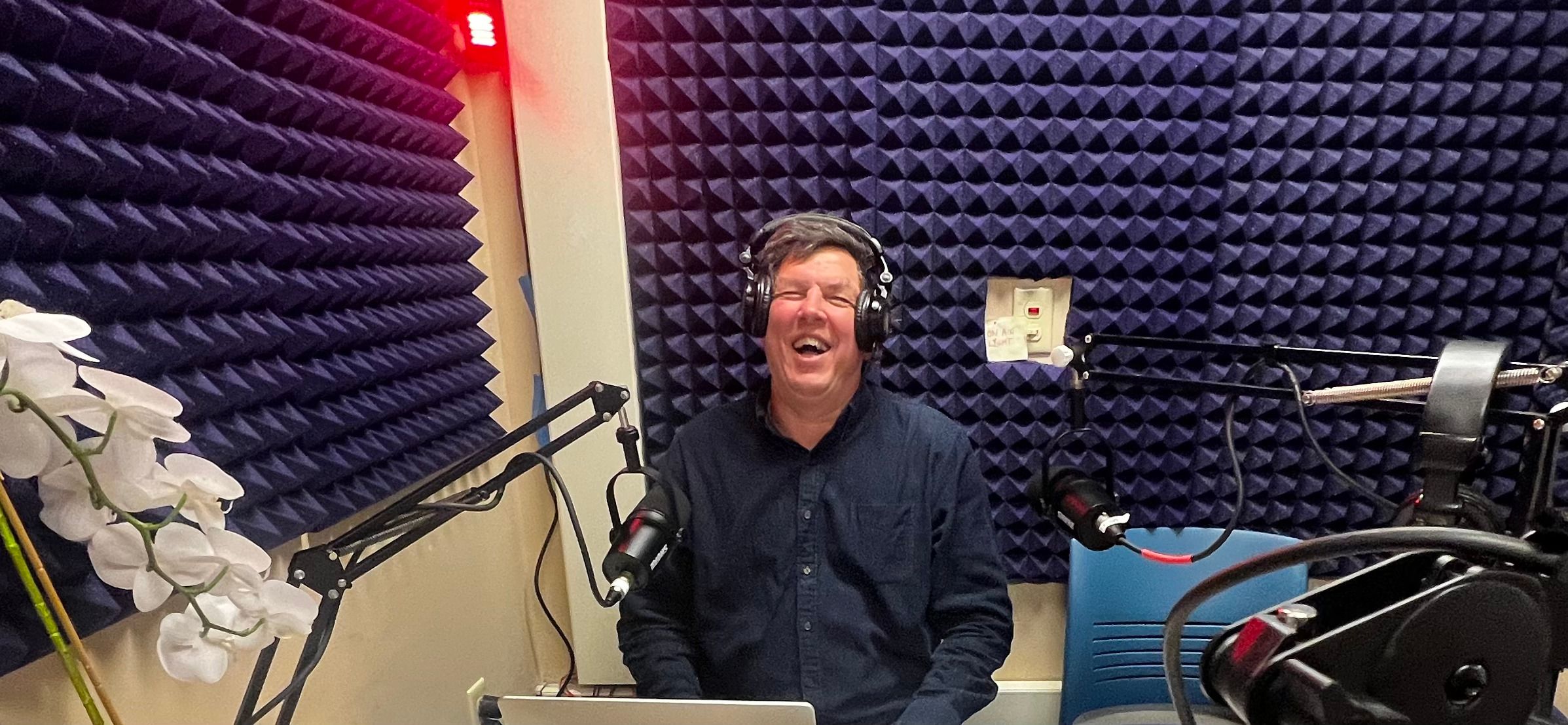 Mike laughing at the mic in the DSR studio
